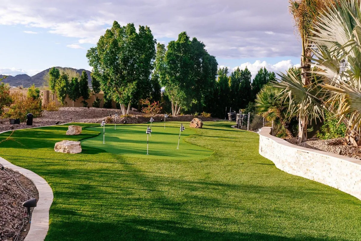Backyard putting green with mountain views