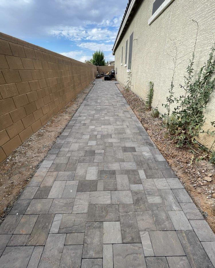Paver walkway alongside home